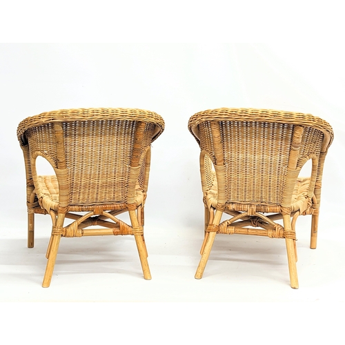 262 - A pair of child's wicker chairs. 46x46x55cm