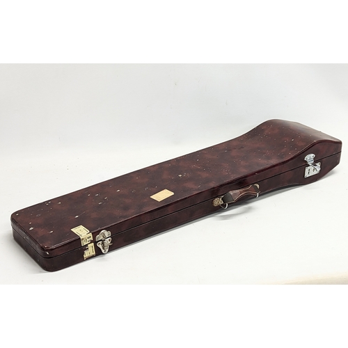 245 - A rosewood and snakeskin Chinese Erhu musical instrument in case.