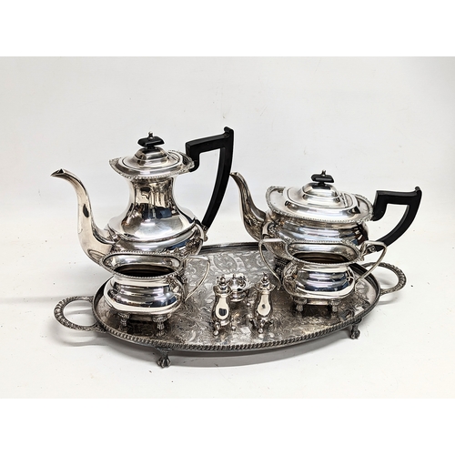 712 - A silver plated tea service.