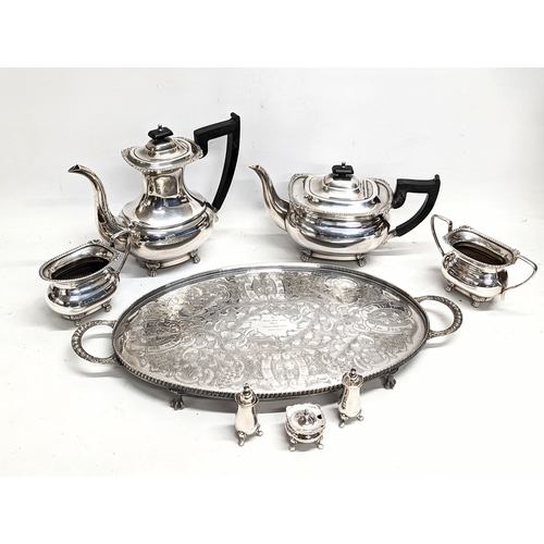 712 - A silver plated tea service.