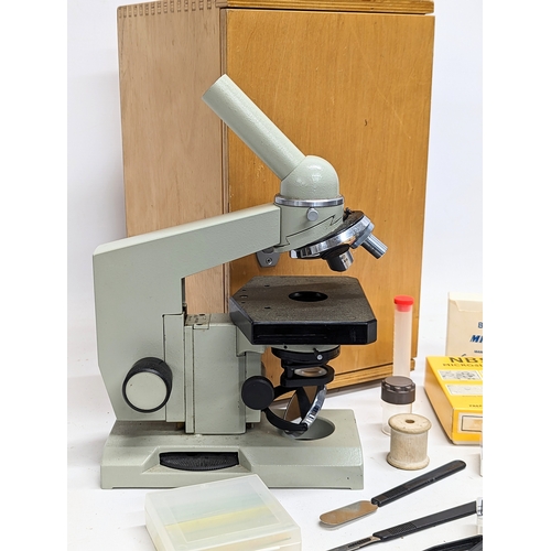 260 - A microscope, made in USSR, in case, with Microslides, etc.