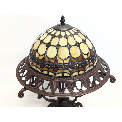 428 - A Tiffany style table lamp. 42cm