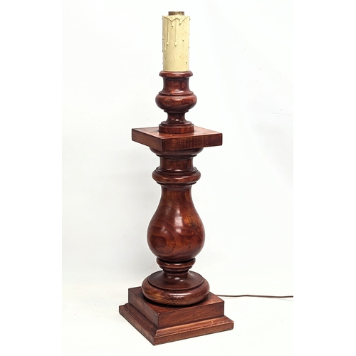 431 - A large pair of wooden table lamps
 75.5cm