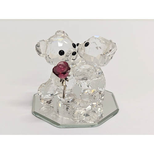 439 - A Swarovski Crystal Bears, A Rose For You. In original box. 4cm