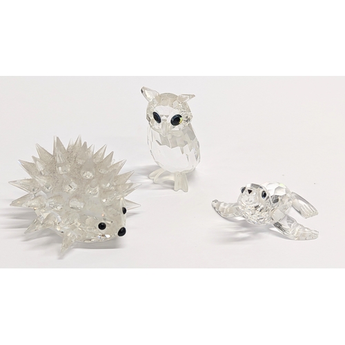 440 - A Swarovski Crystal figures including Hedgehog, Night Owl, and Sea Lion, in boxes.