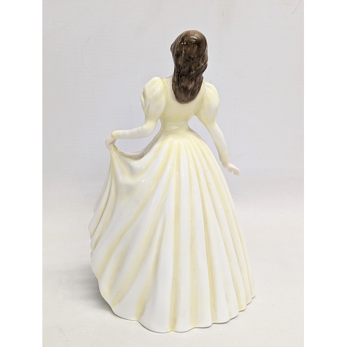 450 - A Royal Doulton pottery figurine, 