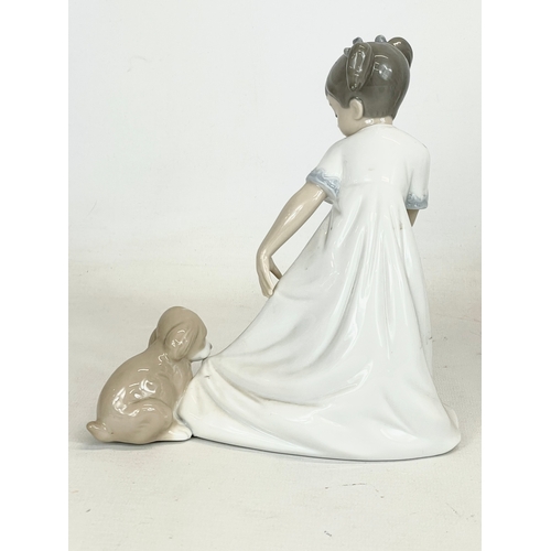 503 - A Nao pottery figurine ‘Let Me Go’ 16x17cm