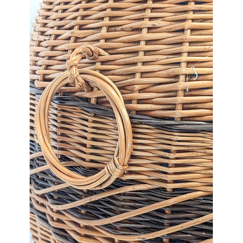 269 - A large good quality wicker 2 handled linen hamper with lid. 59cm