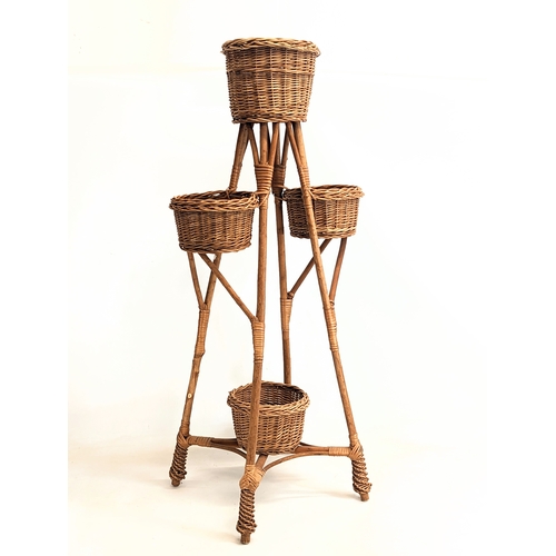 270 - A tall good quality wicker plant stand. 104cm