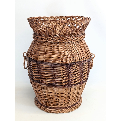 272 - A large good quality wicker 2 handled linen hamper with lid. 61cm