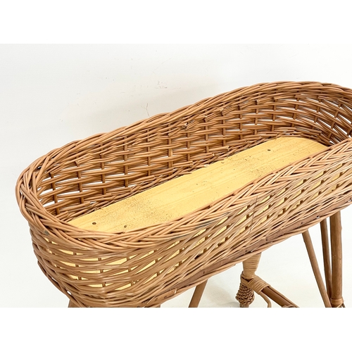 275 - A good quality wicker planter. 70x29x57cm