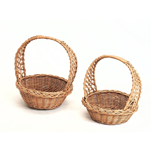 276 - A good quanlity wicker magazine rack with 2 wicker handled baskets.