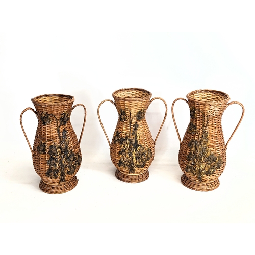 279 - 4 pieces of good quanlity wicker, 2 handled vases with basket. Vases measure 35cm