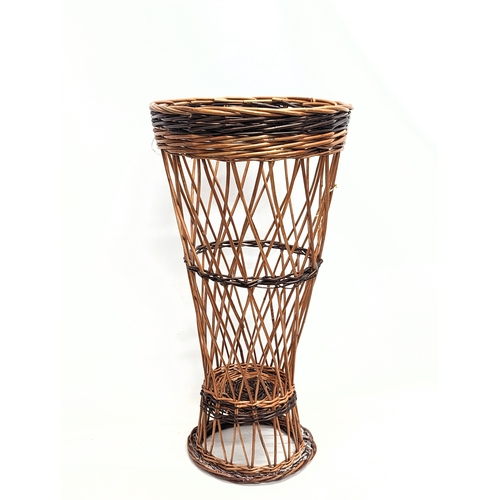 285 - 4 pieces of good quality wicker including 2 rug beaters, serving tray and stick stand. Stick stand m... 