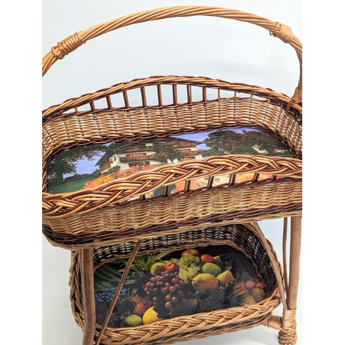 289 - A good quality wicker 2 tiered basket. 55x72.5cm