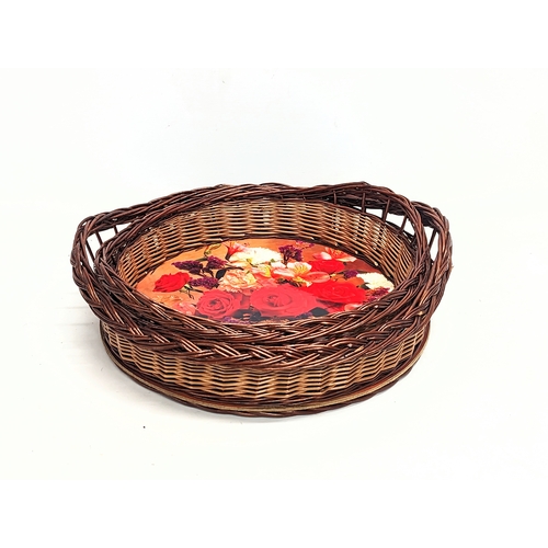 295 - A set of 2 good quality wicker serving trays.