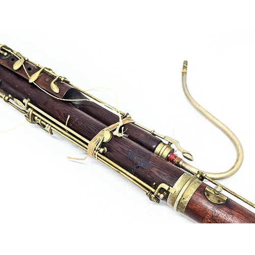 328 - A vintage Hawkes & Son bassoon, Excelsior Sonorous Class, London.