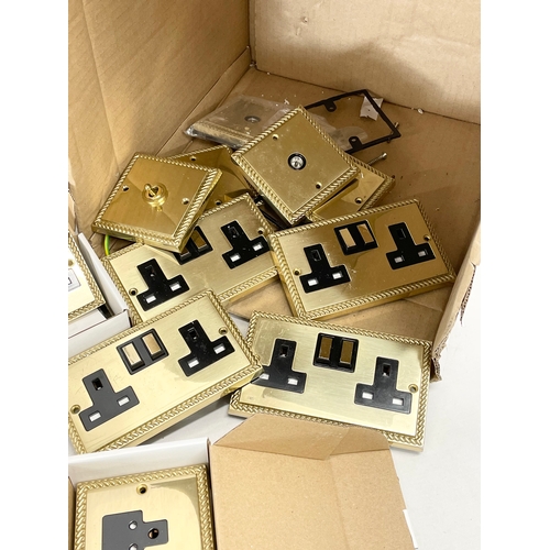 362 - A good collection of Jim Lawrence Hand Finished Switches & Sockets in boxes. 31 2 Gang Plug Sockets ... 