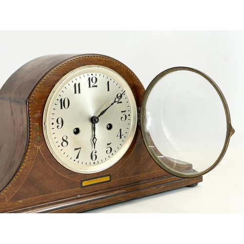 366 - An early 20th century inlaid mantle clock. No key or pendulum. 42x12x13.5cm