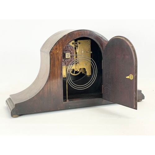 366 - An early 20th century inlaid mantle clock. No key or pendulum. 42x12x13.5cm