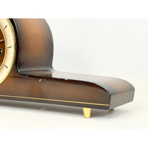 368 - A vintage Hermle walnut and brass mantle clock. No key or pendulum. 51x10x20cm