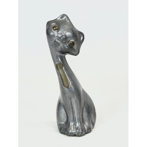 369 - A vintage pewter and brass cat. 11cm