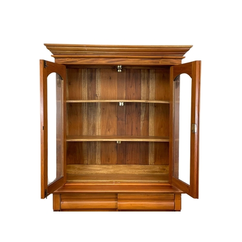 321 - A Victorian style mahogany bookcase with 2 drawers. 115 x 46.5 x 206.5cm