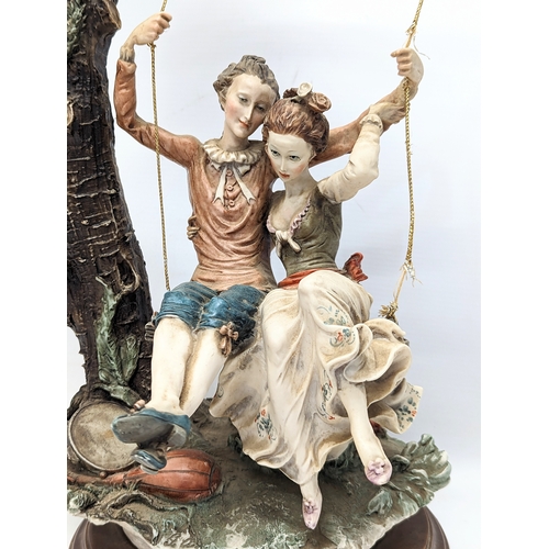 639 - A large Giuseppe Armani Capodimonte pottery figure, 