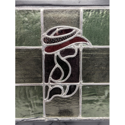 388 - A light up stained glass panel. 46.5cm