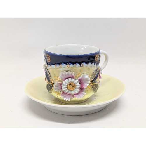 708 - A vintage teacup and saucer.