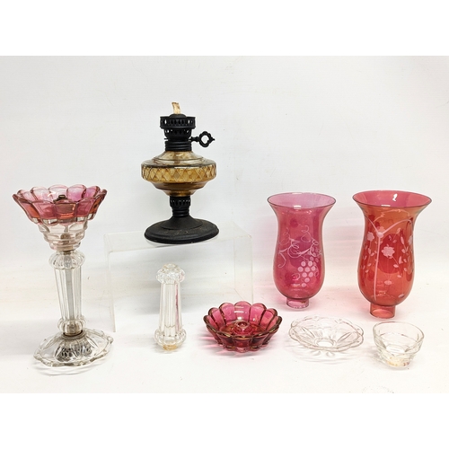 704 - Quantity of vintage glassware, including oil lamp.