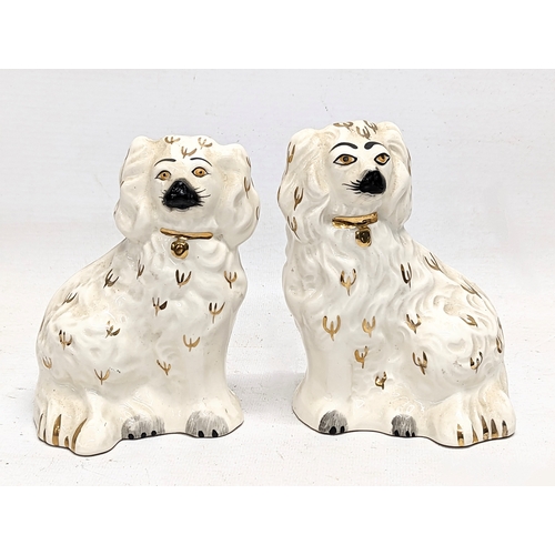 700 - A pair of Beswick dogs. 14cm