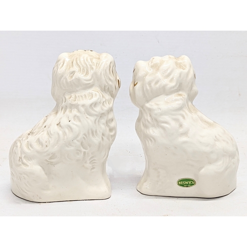 700 - A pair of Beswick dogs. 14cm