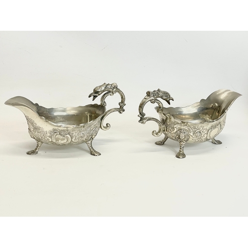 629 - A pair of large good quality 19th century silver plated gravy boats. 23x11x12cm