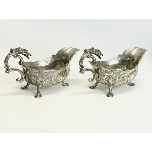 629 - A pair of large good quality 19th century silver plated gravy boats. 23x11x12cm