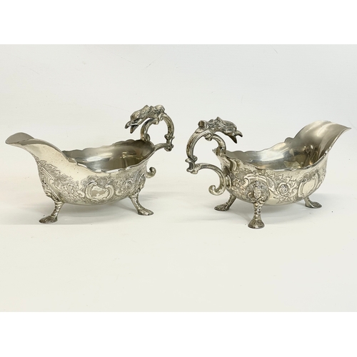 629 - A pair of large good quality 19th century silver plated gravy boats. 23x11x12cm