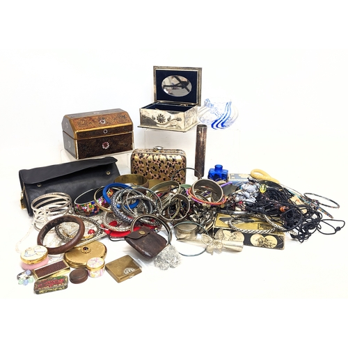 599 - A quantity of costume jewellery, trinket boxes, etc