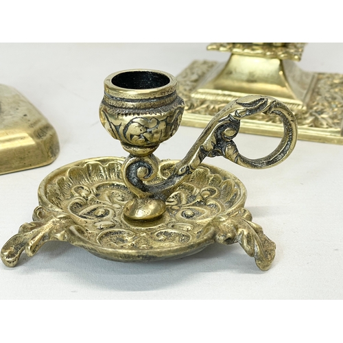 627 - 4 pieces of brass ware. 2 Victorian candlesticks etc.