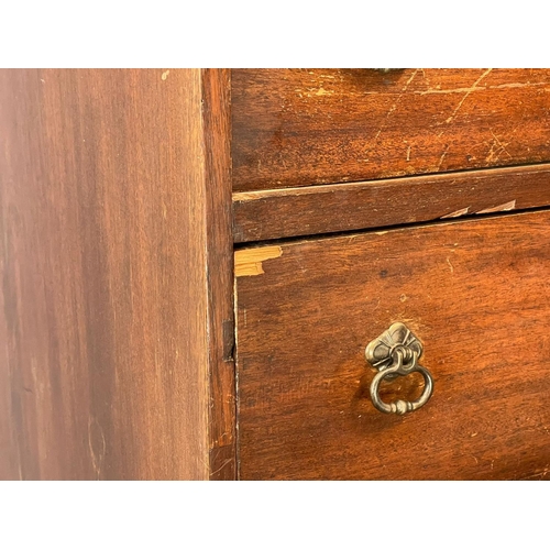 261 - A tall early 20th century mahogany chest of drawers. Circa 1920. 66x46.5x136cm