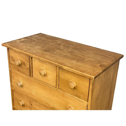 267 - A tall heavy pine chest of drawers. 91x48x147cm