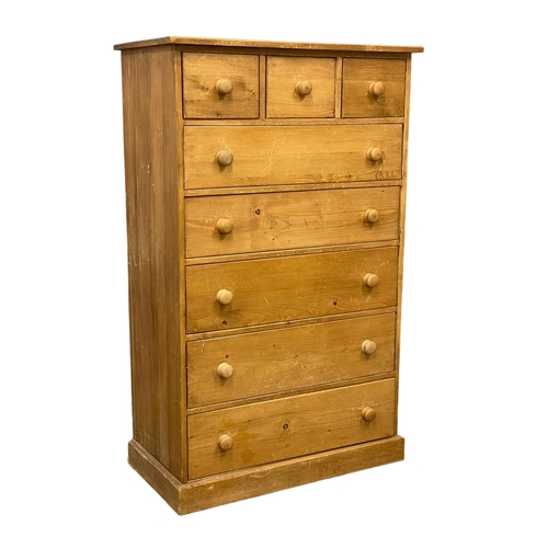 267 - A tall heavy pine chest of drawers. 91x48x147cm