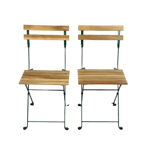 316 - A folding garden table and 2 chairs. Table measures 55x54x72cm