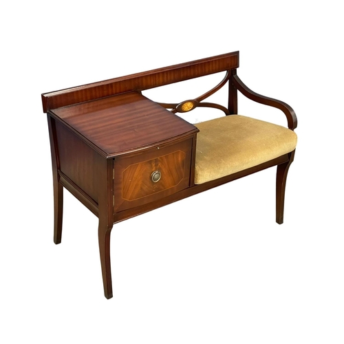 373P - A Chippy Heath inlaid mahogany telephone table. 93x42x69cm