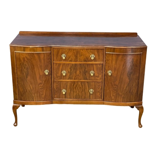 373F - A vintage Walnut veneer sideboard. 139x51x96cm