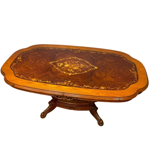 78 - An ornate inlaid Italian dining table. 158x92x73cm