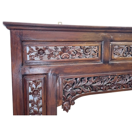 80 - A very large carved mahogany framed over-mantle mirror. 185x115cm