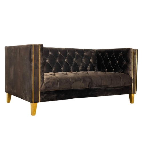 87 - A modern suede 2 seater sofa with brass feet. 153cm