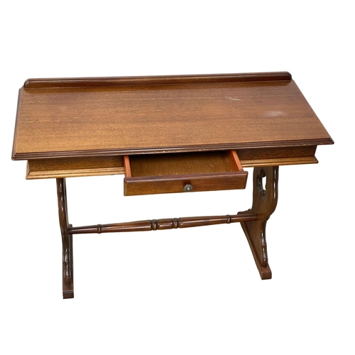 89 - A mahogany side table with drawer. 107x43x76cm