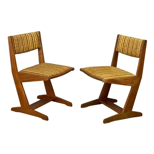 891 - A set of 4 Mid Century teak dining chairs with original upholstery.