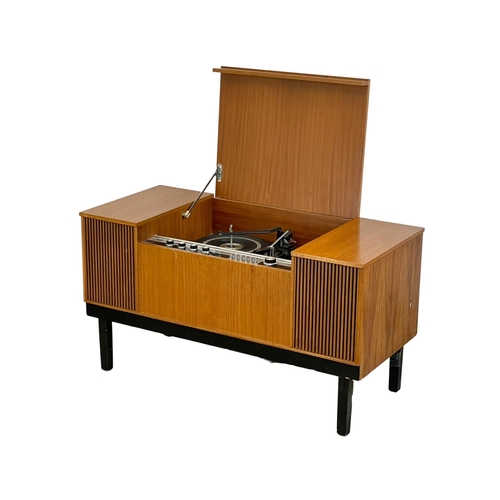 899 - A Mid Century teak radiogram. WYE Electronics LTD. 100x44.5c55cm